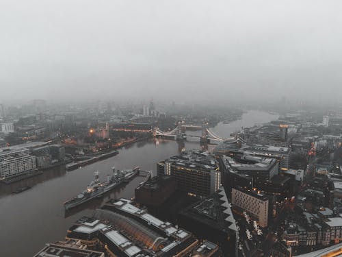 Drone Shot of Cityscape under Foggy Weather
