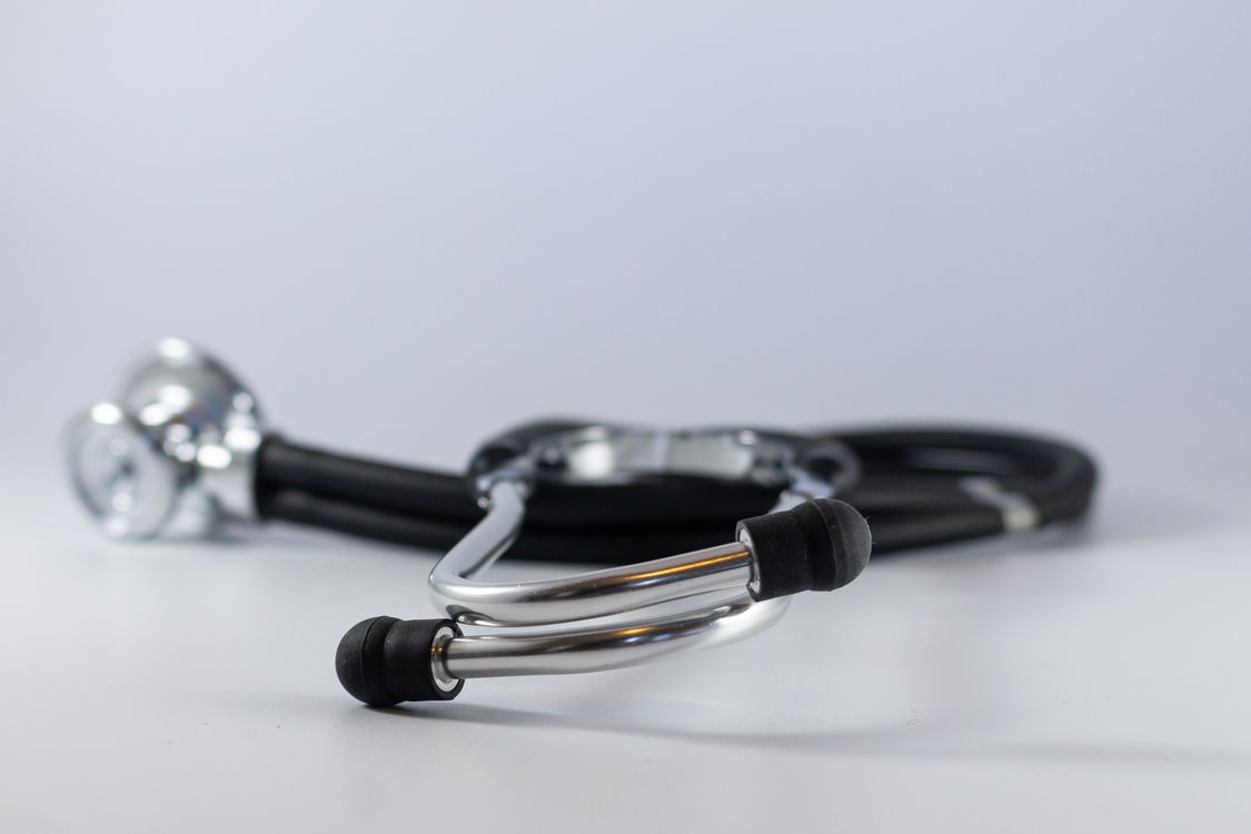 A medical stethoscope on a clean surface