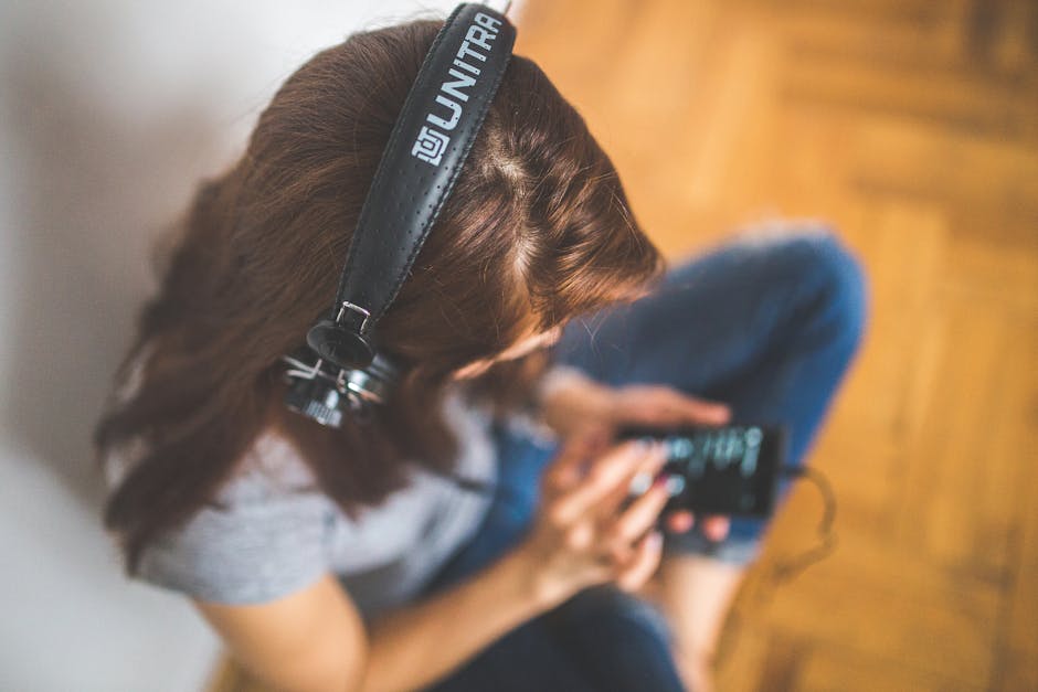 Woman with headphones listening music