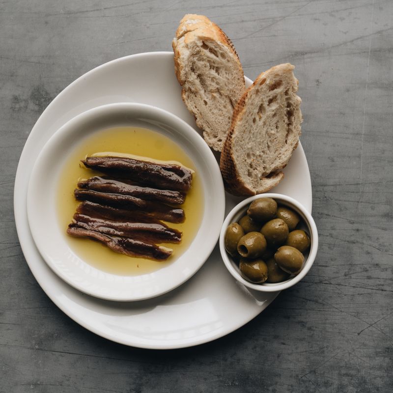 Sourdough Pissaladière Crackers with Niçoise Olives and Anchovies