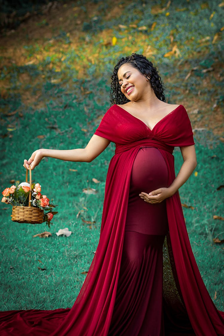 Happy Black Pregnant Woman In Nature