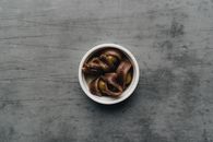 Brown Coffee Beans in White Ceramic Mug