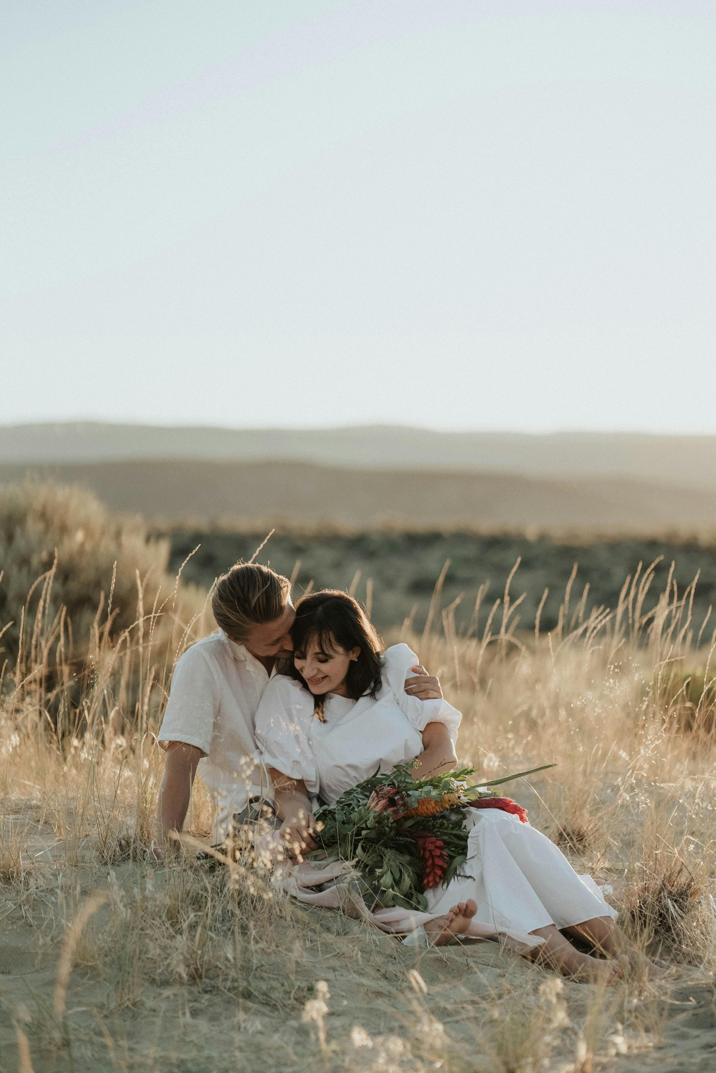 Couple enjoying hillside view, Chas de Egua, Portugal - Stock