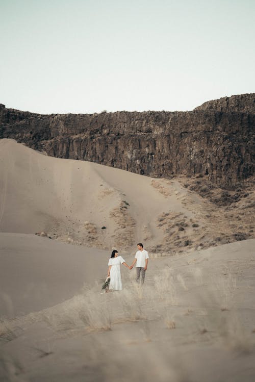 Young couple enjoying vacation in desert