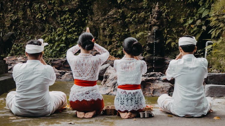 Group Of People In Prayer Position