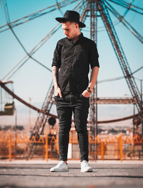 Man in Black Dress Shirt Standing On The Road