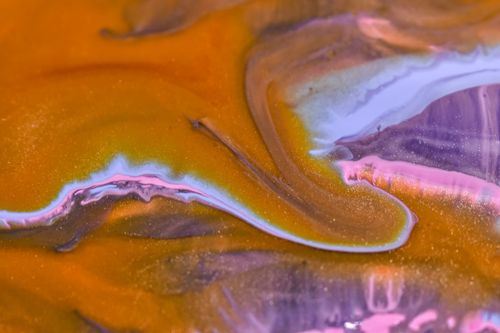 Free A vibrant close-up of flowing acrylic paints showcasing a dynamic mix of colors and textures. Stock Photo