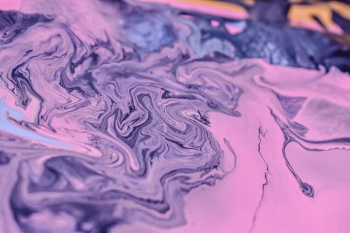Free Abstract expressionism with vibrant purple and pink acrylic paint swirls. Stock Photo