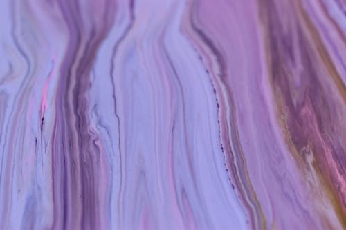 Abstract background of artwork representing brown and violet tint fluids with curved thin lines