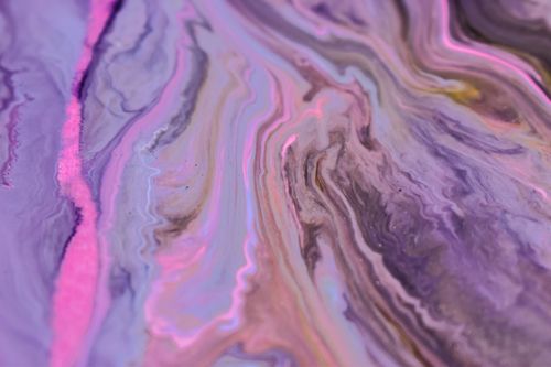 Free Full frame abstract colorful background of leaking blue and pink ink mixing and dissolving Stock Photo