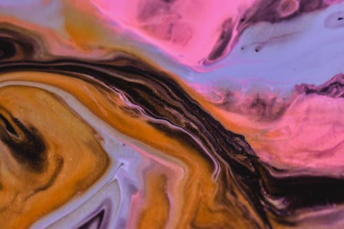 Abstract background of multicolored spilled fluids