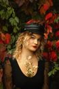 A Pretty Blonde-Haired Woman in Black Top and Black Beret
