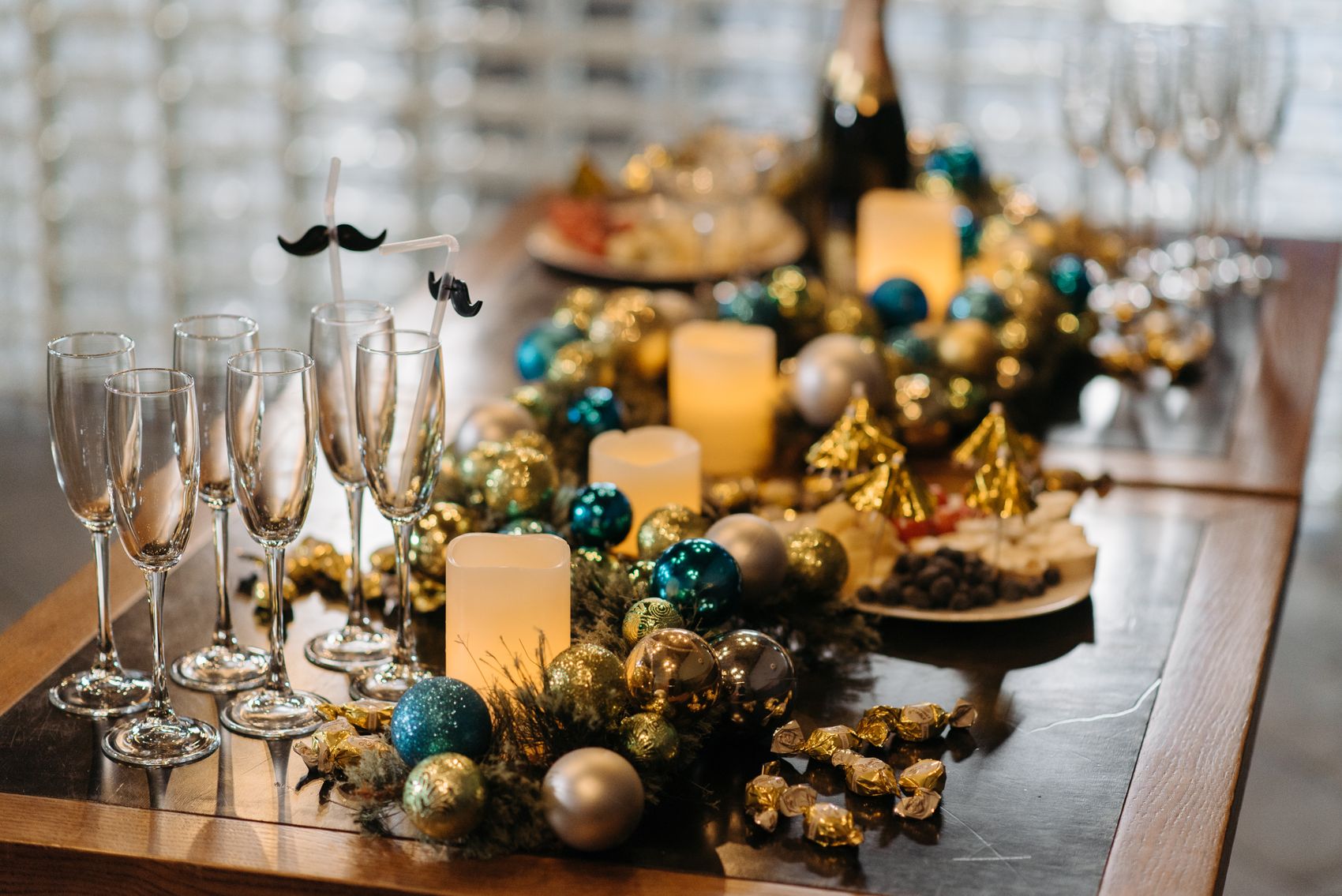 Elegant seasonal celebration table with candles and festive decorations