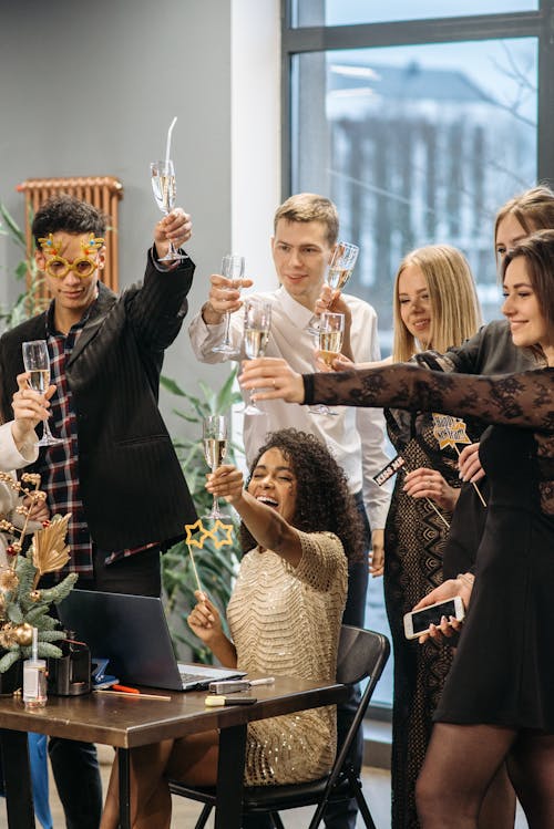 Free People Making A Toast At A Zoom Party Stock Photo