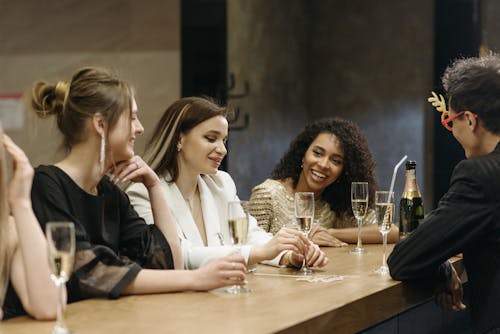 Free Women in the Bar Drinking Champagne Stock Photo