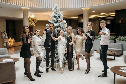 Group of People Raising Their Glasses