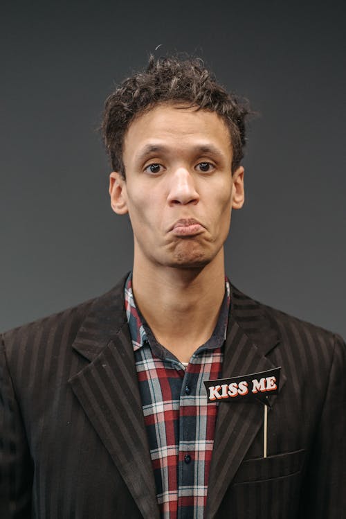 Close-up Photo of Man in Black Blazer