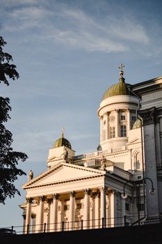 Beautiful view of Helsinki Cathedral's ornate architecture at sunset.