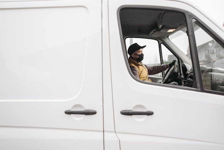 Man Driving A Delivery Van