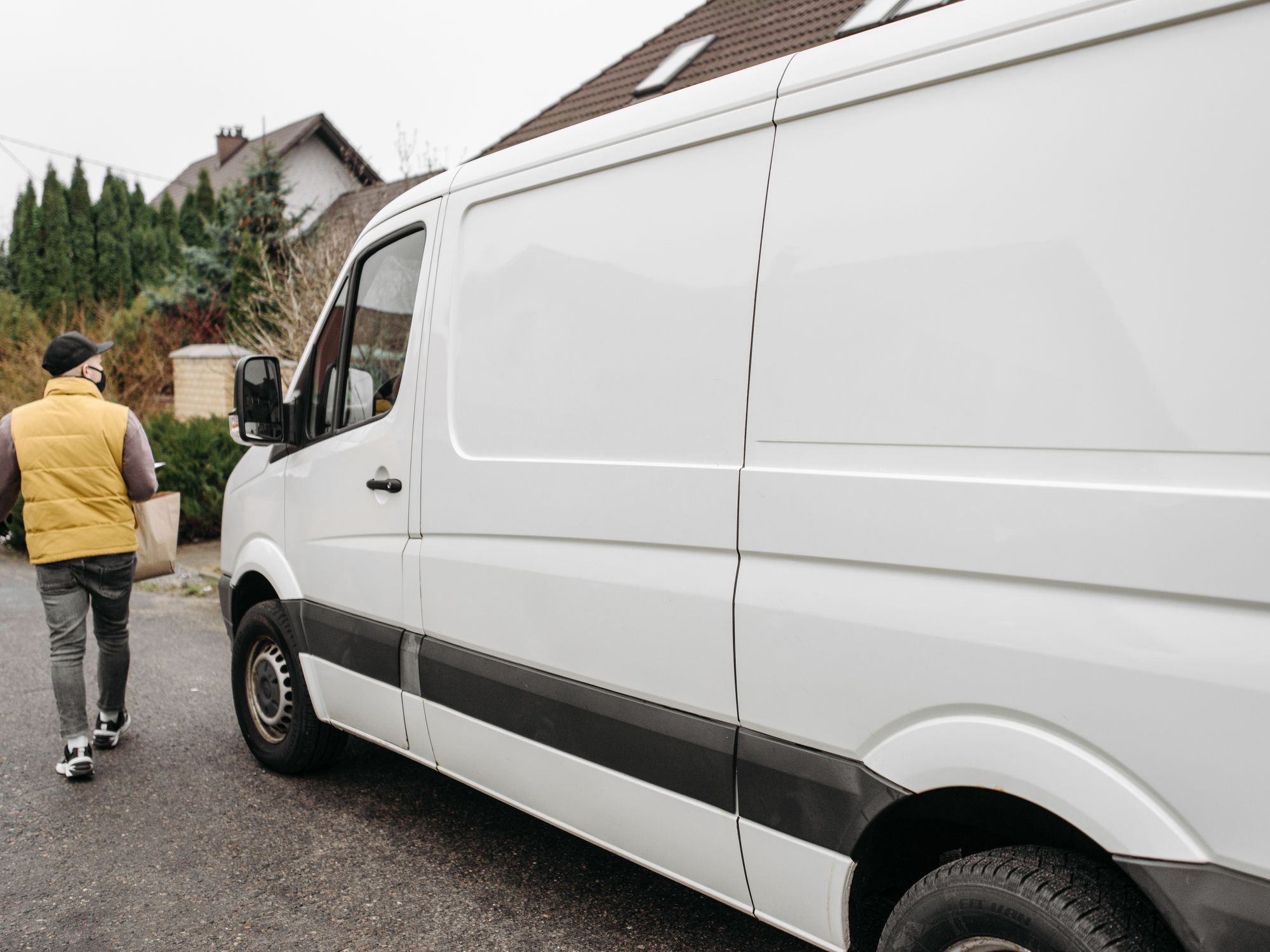 Furniture & Delivery in Alfriston, South East — movers delivering furniture from a van