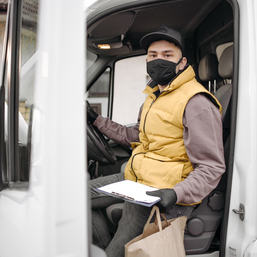 Bearsden — house clearance team loading furniture into a van