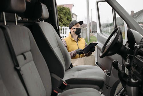 Man Checking His Clipboard