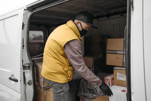 Man Arranging the Boxes