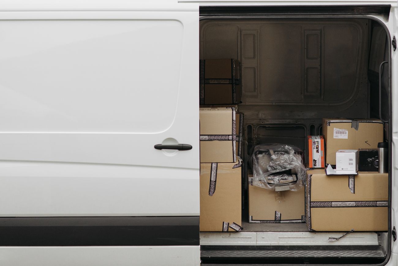 Open delivery van with boxes inside