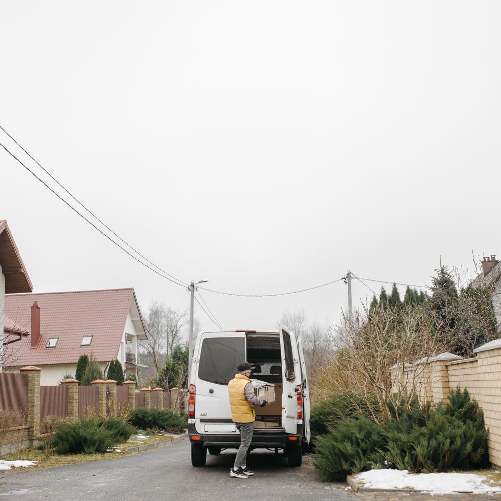Abercanaid — house clearance team loading furniture into a van