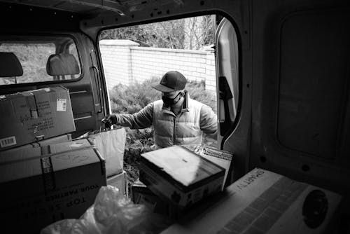 Man Delivering a Paper Bag