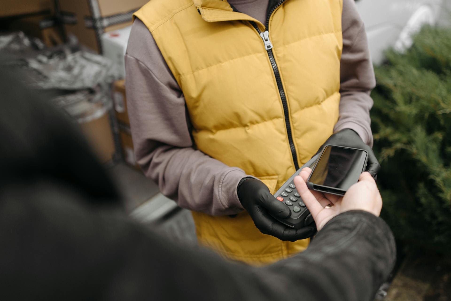 A Person Making a Contactless Payment