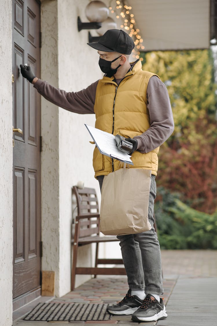 Man Knocking On Door