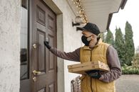 Delivery Man Knocking on a Door