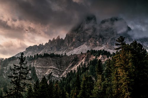 Photo of Mountain With Ice Covered With Black and Gray Cloud