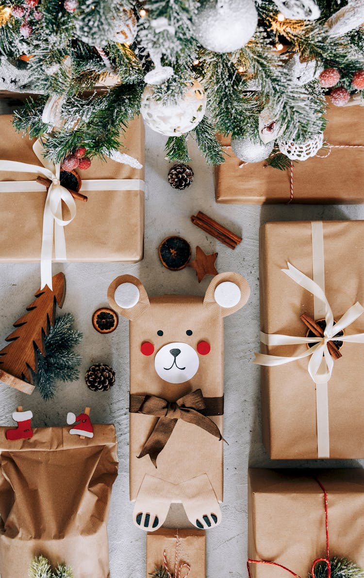 Present Boxes Arranged On Floor Under Decorated Christmas Tree