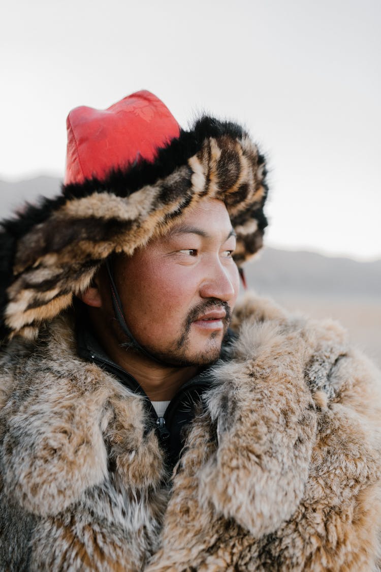 Close-Up Shot Of A Man In Fur Clothes