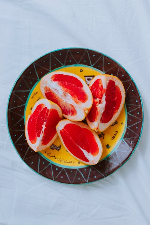 Slices of Grapefruit on a Plate