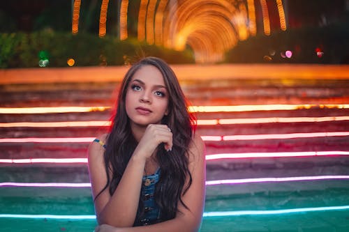 A Woman Near Concrete Steps while looking Afar