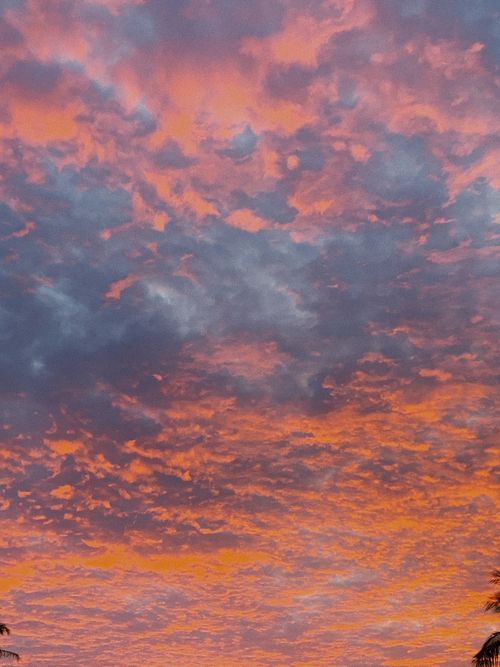 Free Stunning orange and purple clouds in a sunset sky over Phú Quốc, Vietnam. Stock Photo