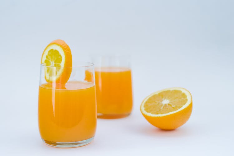 Freshly Squeezed Orange Juice In Glasses