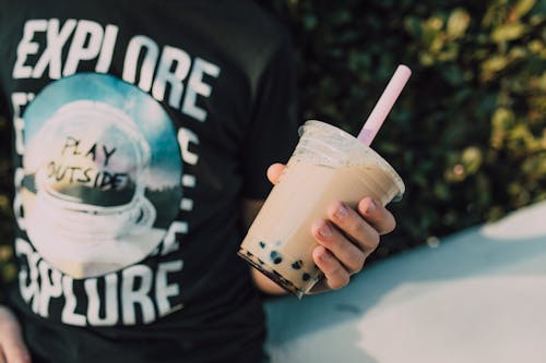 Free Person Holding a Boba Tea Stock Photo