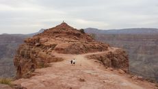 People Walking on Brown Mountain