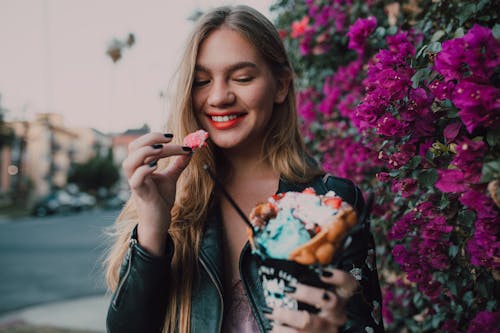 A Woman Holding an Ice Cream
