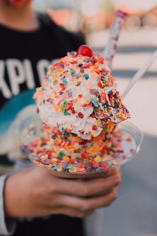 Ice Cream With Sprinkles on Clear Glass Cup