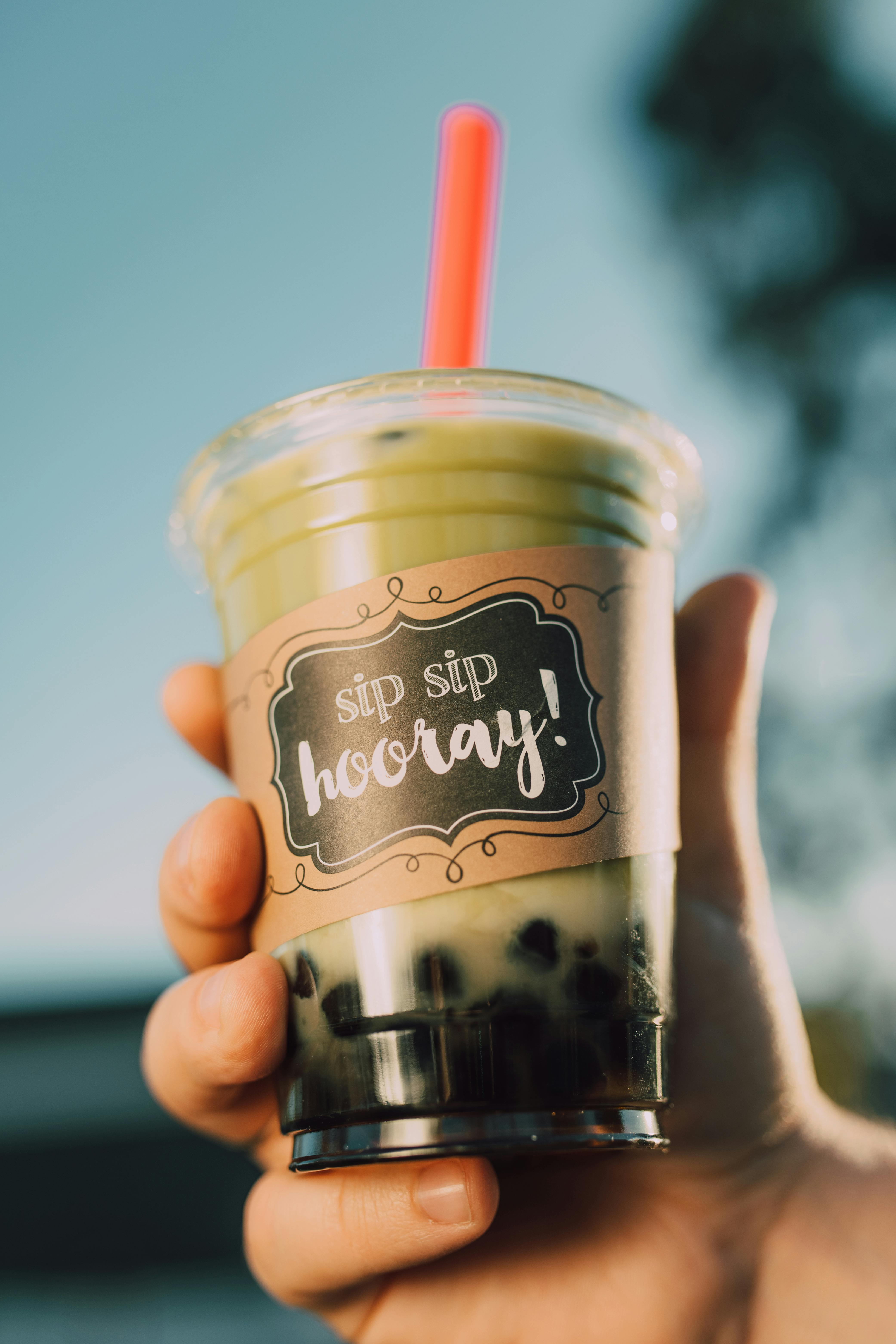 Thai Milk Tea in Plastic Cup with Straw and Boba Stock Photo