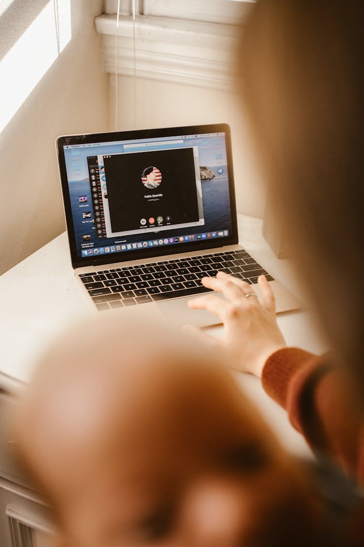 Person Video Calling Using A Laptop