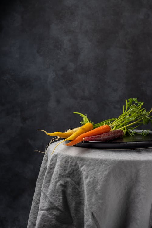 Photo of Carrots on a Black Plate
