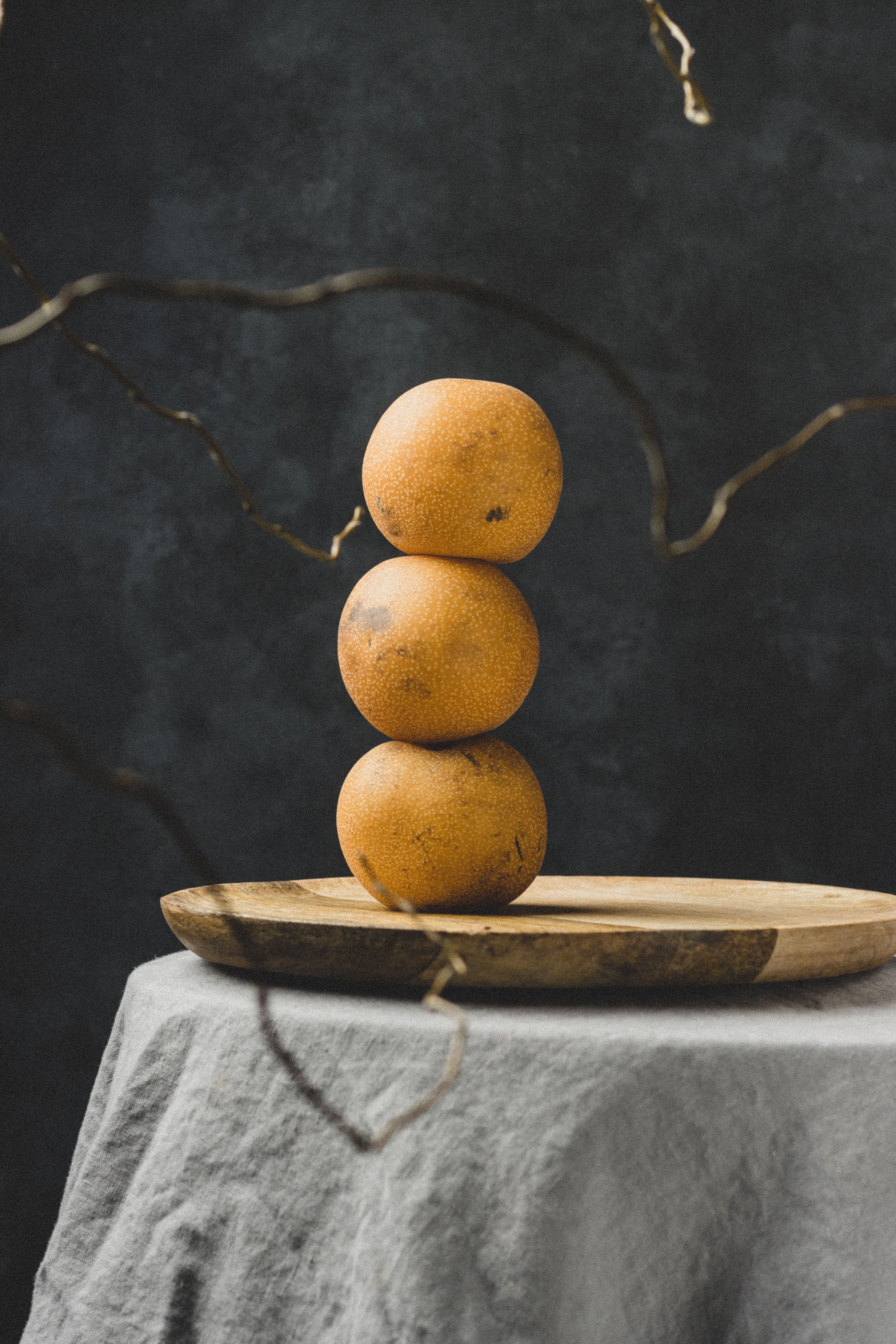 A Stack of Pears on a Wooden Board · Free Stock Photo