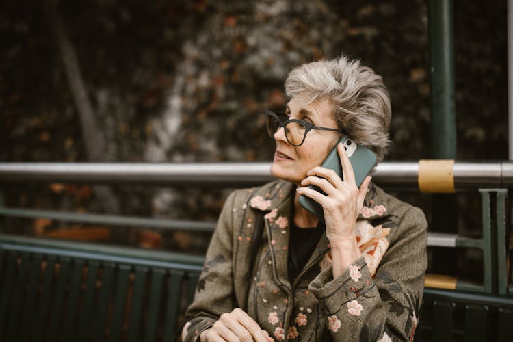 A Mature Woman Using A Cellphone
