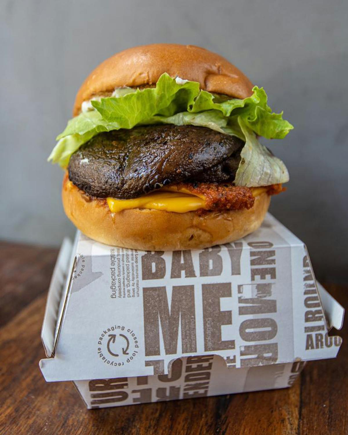 Cottage cheese bowl topped with tomatoes, cucumber, and herbs